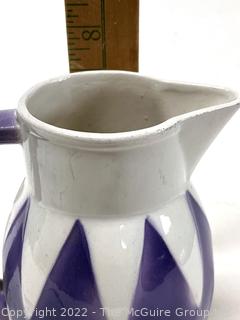 Enamel Glaze Pottery Pitcher with Purple Diamond Pattern, Made in Germany, Signature On Base.  7" tall. 