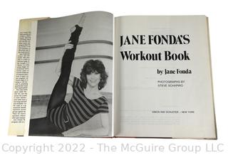 (6) Books including two small leatherbound volumes (only 1 shown) and Jane Fonda's Workout Book