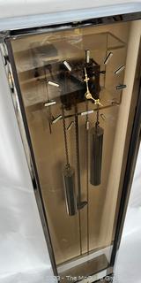 Post Modern Howard Miller Bronze Plexiglass and Chrome Weight Driven Floor Clock.  