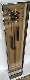 Post Modern Howard Miller Bronze Plexiglass and Chrome Weight Driven Floor Clock.  