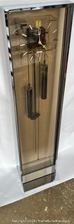 Post Modern Howard Miller Bronze Plexiglass and Chrome Weight Driven Floor Clock.  