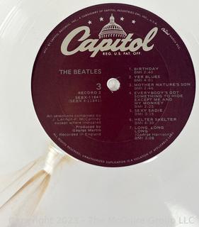 Vinyl Record Album: "The Beatles" White Album on White Vinyl Double Album with Four (4) Pictures of Band Members and Poster. Capitol Records 1978. Discoloration to both records SN# SEBX-4-11841