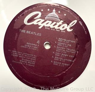 Vinyl Record Album: "The Beatles" White Album on White Vinyl Double Album with Four (4) Pictures of Band Members and Poster. Capitol Records 1978. Discoloration to both records SN# SEBX-4-11841