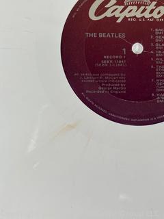 Vinyl Record Album: "The Beatles" White Album on White Vinyl Double Album with Four (4) Pictures of Band Members and Poster. Capitol Records 1978. Discoloration to both records SN# SEBX-4-11841