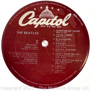 Vinyl Record Album: "The Beatles" White Album on White Vinyl Double Album with Four (4) Pictures of Band Members and Poster. Capitol Records 1978. Discoloration to both records SN# SEBX-4-11841