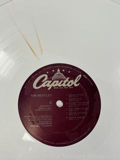 Vinyl Record Album: "The Beatles" White Album on White Vinyl Double Album with Four (4) Pictures of Band Members and Poster. Capitol Records 1978. Discoloration to both records SN# SEBX-4-11841