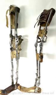 Pair of Two (2) Orthotic Polio Full Leg Braces with Leather Straps, Made by Klenzak Braces Kankakee Ill.  One hinge separated