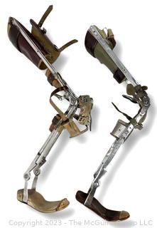 Pair of Two (2) Orthotic Polio Full Leg Braces with Leather Straps, Made by Klenzak Braces Kankakee Ill.  One hinge separated