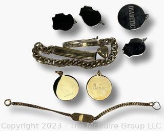 Group of Pendants and ID Bracelets