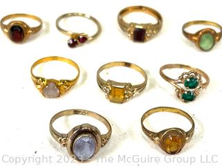 Group of Nine (9) Childrens' Rings with Crystal Centers, 10K Gold