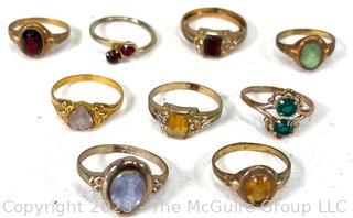 Group of Nine (9) Childrens' Rings with Crystal Centers, 10K Gold