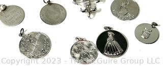 Seven (7) Sterling Silver Round Disc Pendant Charms and Sterling Fleur-de-lis Brooch.