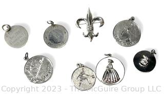 Seven (7) Sterling Silver Round Disc Pendant Charms and Sterling Fleur-de-lis Brooch.