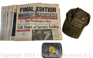 Korean War Veteran's Hat and the Final Edition of The Washington Star Newspaper. 