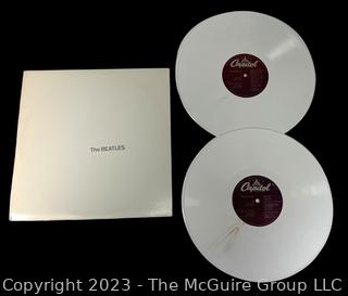 Vinyl Record Album: "The Beatles" White Album on White Vinyl Double Album with Four (4) Pictures of Band Members and Poster. Capitol Records 1978. Discoloration to both records SN# SEBX-4-11841