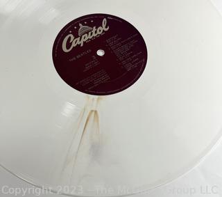 Vinyl Record Album: "The Beatles" White Album on White Vinyl Double Album with Four (4) Pictures of Band Members and Poster. Capitol Records 1978. Discoloration to both records SN# SEBX-4-11841