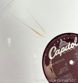 Vinyl Record Album: "The Beatles" White Album on White Vinyl Double Album with Four (4) Pictures of Band Members and Poster. Capitol Records 1978. Discoloration to both records SN# SEBX-4-11841