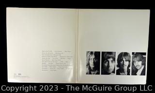 Vinyl Record Album: "The Beatles" White Album on White Vinyl Double Album with Four (4) Pictures of Band Members and Poster. Capitol Records 1978. Discoloration to both records SN# SEBX-4-11841