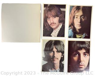 Vinyl Record Album: "The Beatles" White Album on White Vinyl Double Album with Four (4) Pictures of Band Members and Poster. Capitol Records 1978. Discoloration to both records SN# SEBX-4-11841