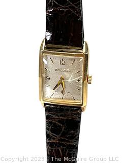 14K Yellow Gold Bulova Tank Wrist Watch on Leather Band. Crystal cracked. {was 1013CD}