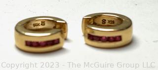 Pair of 14kt Yellow Gold Ruby Huggie Pierced Earrings. 4.9 grams