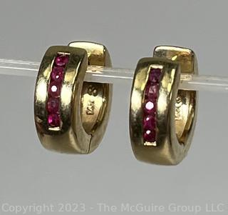 Pair of 14kt Yellow Gold Ruby Huggie Pierced Earrings. 4.9 grams