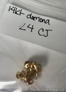 Pair of 14K Yellow Gold with Diamond Center Flower Pierced Earrings.  5.5 grams