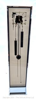 Post Modern Howard Miller Bronze Plexiglass and Chrome Weight Driven Floor Clock.  