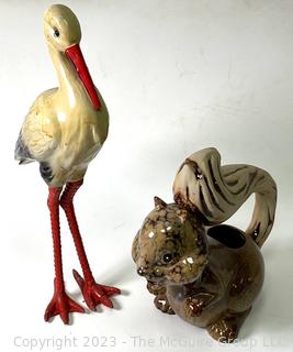 Pelican Yard Art with Cast Iron Legs and Ceramic Squirrel Planter