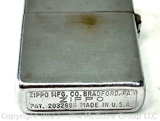 Two (2) Cigarette Lighters, One Zippo