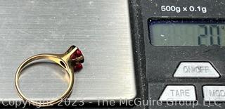 14k Yellow Gold Six Prong Garnet Solitaire Ring. 2g total weight