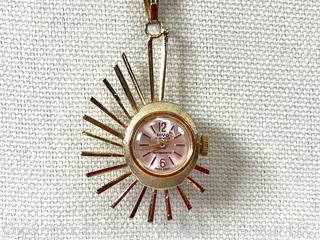 Mid Century Sunburst Style Rivo 17 Jewel Watch Pendant. 