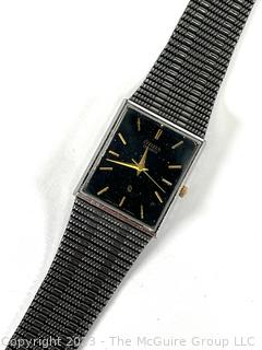 Citizen Quartz Wrist Watch with Black Face and Gold Numbers, Untested