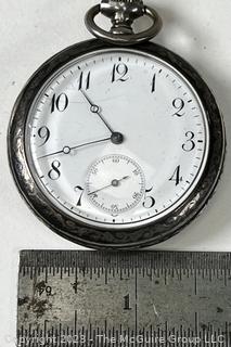 Pocket Watch in Engraved Silveroid Case.  Movement Shown in photo Gallery