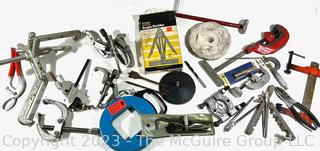 Collection of Shop Tools Including Various Sized Gear Pullers and Metal Pipe Cutter 