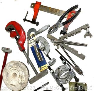 Collection of Shop Tools Including Various Sized Gear Pullers and Metal Pipe Cutter 