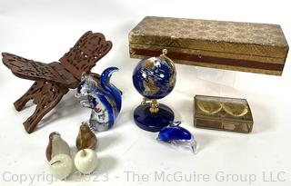 Decorative Items Including Florentine Box, Carved Book Reader, Glass Figurines, Marble Fruit and World Globe Inlaid with Semi Precious Stones. 