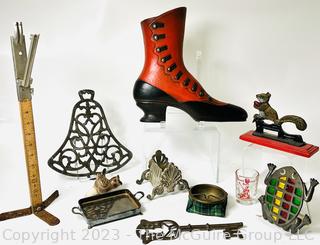 Decorative Items  Including Nut Cracker, Trivet, Wall Plaque, Tailors Rule and Oversized Key.