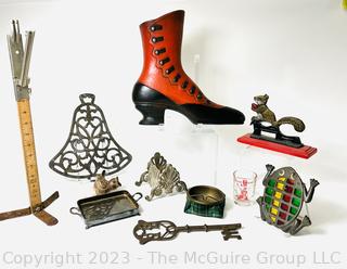 Decorative Items  Including Nut Cracker, Trivet, Wall Plaque, Tailors Rule and Oversized Key.