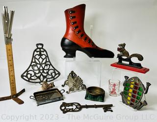 Decorative Items  Including Nut Cracker, Trivet, Wall Plaque, Tailors Rule and Oversized Key.