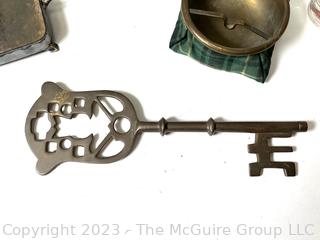 Decorative Items  Including Nut Cracker, Trivet, Wall Plaque, Tailors Rule and Oversized Key.