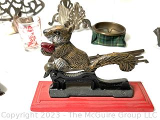 Decorative Items  Including Nut Cracker, Trivet, Wall Plaque, Tailors Rule and Oversized Key.