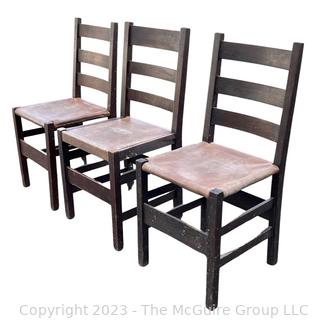 Set of Three (3) L&JG Stickley Ladderback Dining Chair with Leather Seats. Some repairs needed and some restoration has been done. Stickley Stamp found on two of three chairs.  