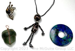 Collection of Jewelry Including Lampwork Bead Necklace and Stone Pendants.