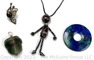 Collection of Jewelry Including Lampwork Bead Necklace and Stone Pendants.