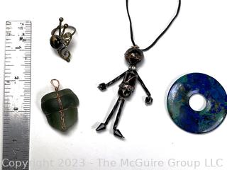 Collection of Jewelry Including Lampwork Bead Necklace and Stone Pendants.