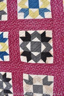 Vintage Hand Made Quilt in the Salem Block Pattern. Measures 72" x 75".