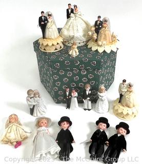 Collection of Vintage Cake Toppers in Hat Box.  Includes Madame Alexander Bride and Groom Dolls. 