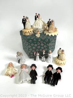 Collection of Vintage Cake Toppers in Hat Box.  Includes Madame Alexander Bride and Groom Dolls. 