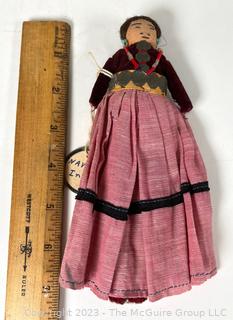 Vintage Native American Navajo Folk Art Doll with Hammered Metal Ornament.